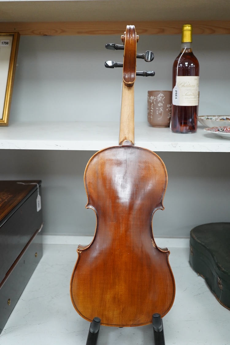 A mid 20th century cased Czech viola 15.25” body, with a fully mounted octagonal bow with plastic tip plate